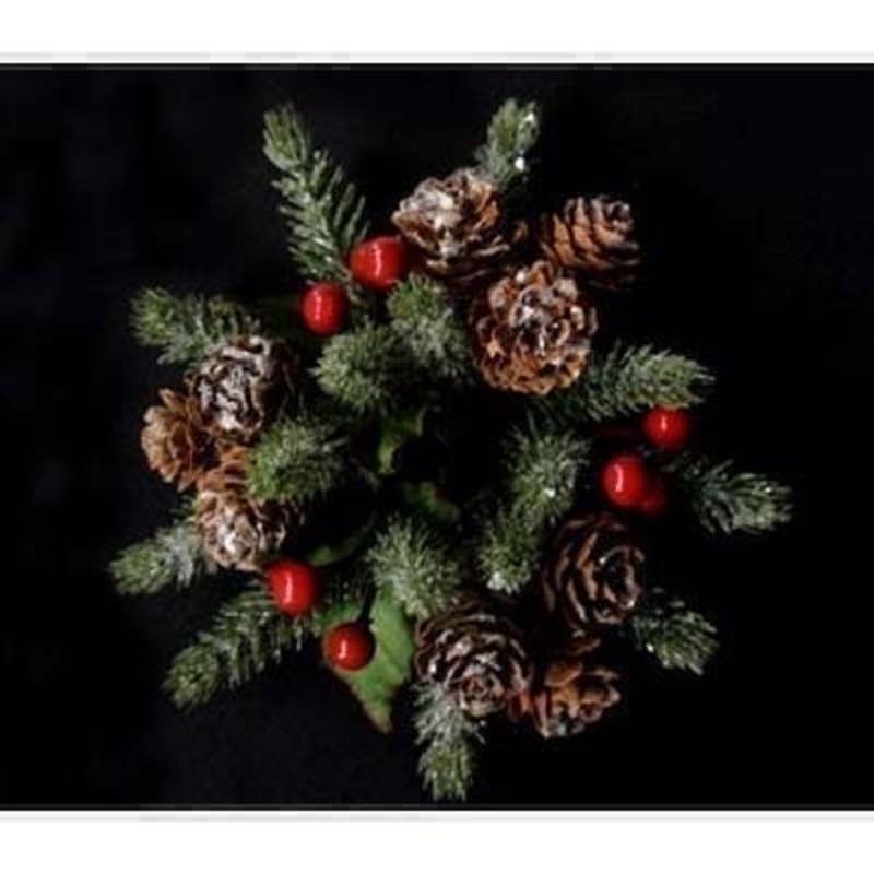 A wonderful addition to your dinner table this Christmas. Decorated red berries and pine cones and dusted with a frosting this traditional candle ring is timeless in style. Also available in large size. Approx size 4x11.5x11.5cm